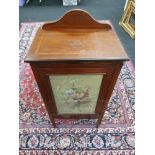 A Victorian Mahogany inlaid sheet music cabinet on tapered legs with tapestry frontage. H:91.5 W: