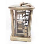 Brass carriage clock, marked to base - 11cm high.