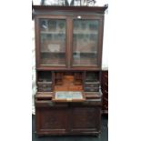 A large display bookcase/bureau - 114cm wide x 43cm max depth x 223cm high.