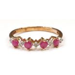 A Ruby and Diamond 9ct gold ring.