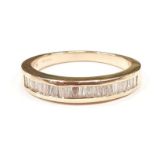 A 9ct gold diamond 1/2 eternity ring, Size T.