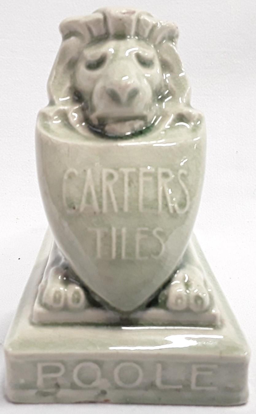 Carters & Co Poole Pottery Lustre advertising lion desk paperweight.
