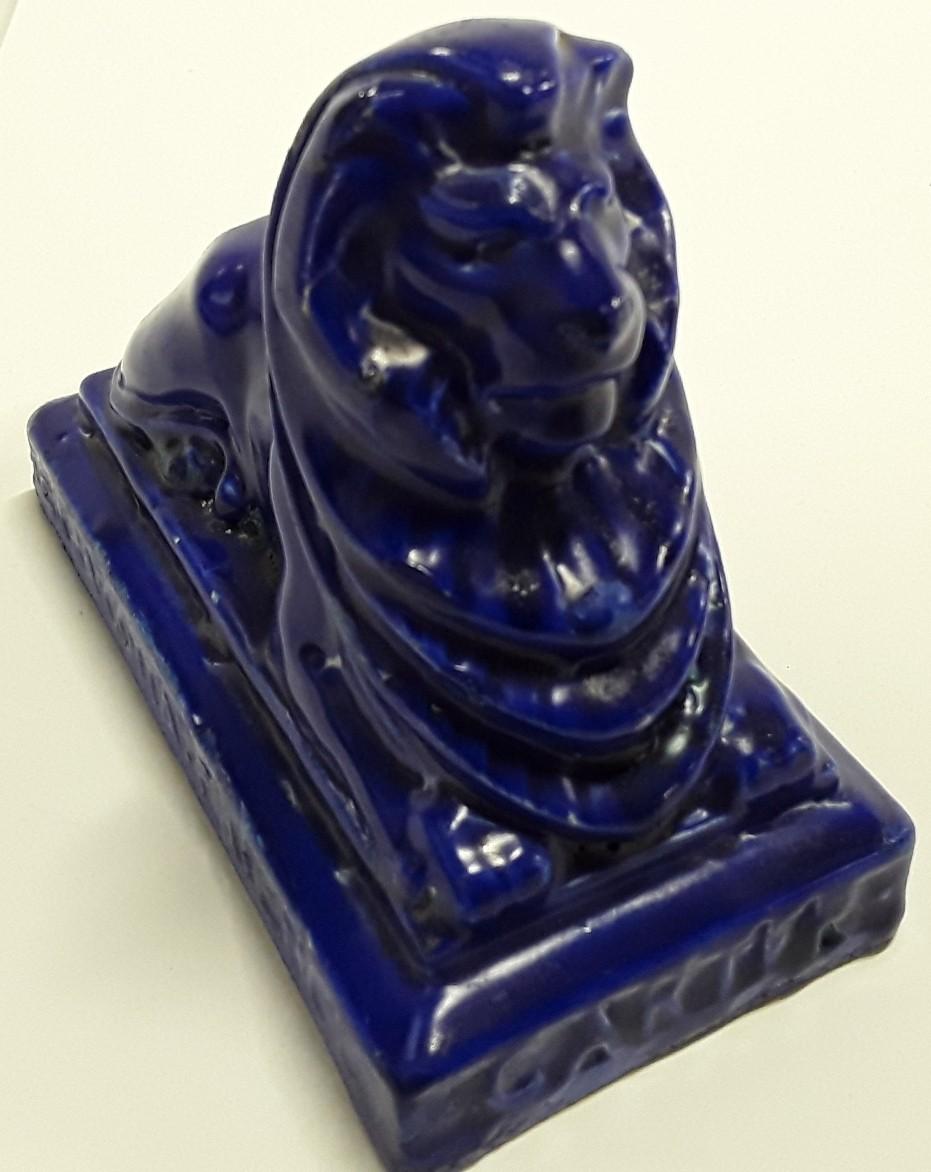 Carters & Co Poole Pottery advertising lion desk paperweight.