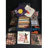 DECCA SINGLES BOX OF VINYL 45RPM 7" RECORDS. This collection covers many decades and includes