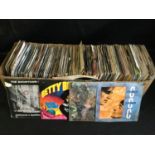 LARGE LONG BOX OF 45RPM RECORDS. This box contains mainly a selection of 70's and 80's hit