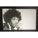 JIMI HENDRIX CANVAS PRINT. Black & white print of Jimi Hendrix in deep thought smoking a