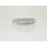 A 9ct gold Ladies diamond bar set ring with approx 0.5ct, Size Y.