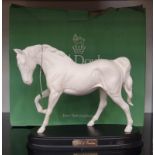 A Royal Doulton horse sculpture on wooden base: Spirit of Freedom.