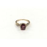 10ct gold diamond and garnet ladies ring. Size N.