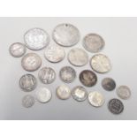 Various English and foreign silver coins.