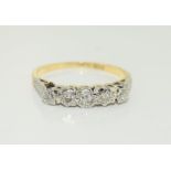 18ct yellow gold and Platinum set five stone Diamond ring. Size Q.