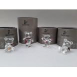 Swarovski Crystal: Kris Bears - Honeypot, Skates, Original (reclining), plus one holding flowers (