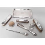 Collection of silver dressing accoutrements to include a solid silver tray.