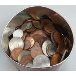 A tin of miscellaneous coins.