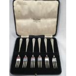 A set of 6 solid silver miniature Old English pattern forks - Isaac Ellis & Sons, Sheffield 1905.