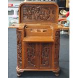 A vintage oak bar unit with carved frontage. 80cm wide x 95cm high x 45cm deep.