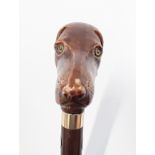 Fine quality walking stick with dog's head, had crafted in England.