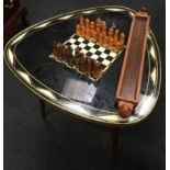 Retro chessboard table together with full set of wooden playing pieces. 59cms high.