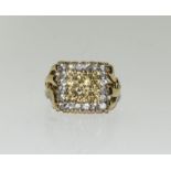 A heavy white and yellow sapphire 9ct gold ring, Size N.
