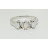 14ct white gold opal & diamond ring, size M.