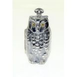 An unusual silver plated sovereign holder in the form of an owl.
