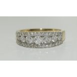 9ct gold 7 stone diamond ladies ring. Size M.