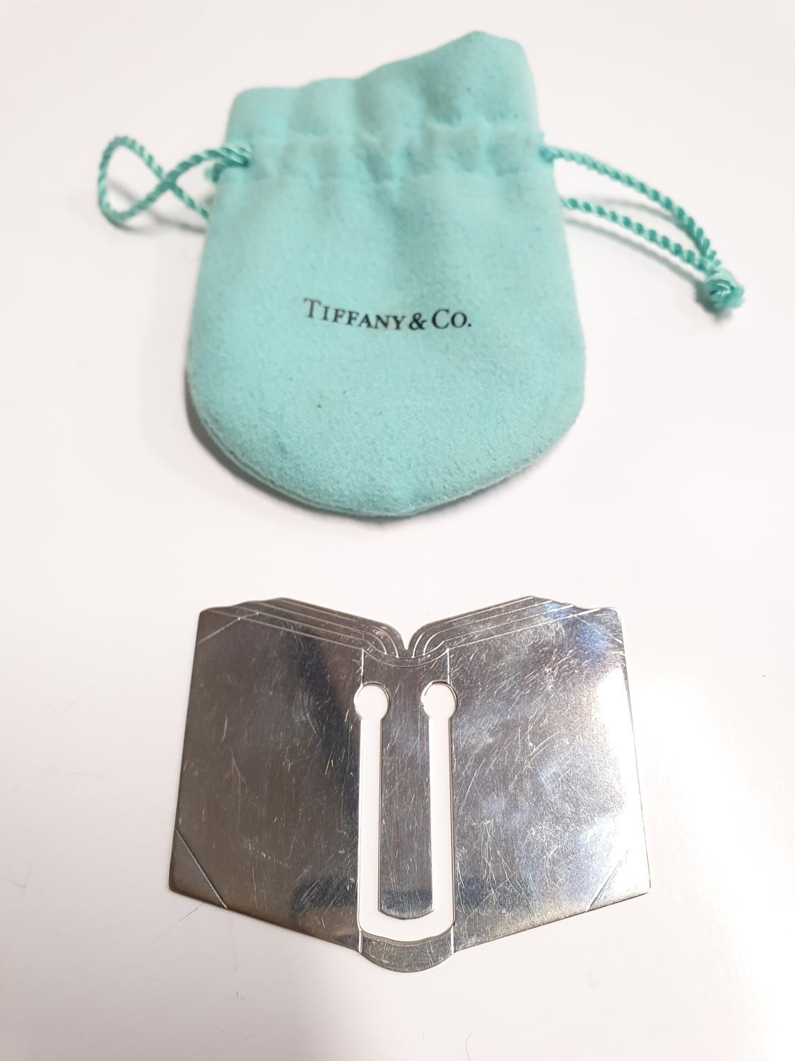 A Tiffany & Co. silver book page marker.