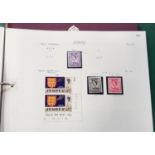 Green stock book of Guernsey & Channel Island stamps, some unfranked, and red Stamford Major stamp