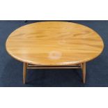 Ercol blonde coffee table shape 454, 1979. 100cm x 83cm.