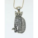 Silver necklace in the form of a cat.