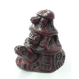 Netsuke in the form of 3 tortoises, signed.