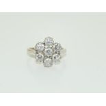 18ct white gold 7 stone diamond cluster ring - approx 1ct total. Size L.