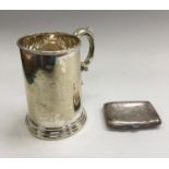 Silver cigarette box and pint tankard.