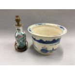 Blue and white Chinese antique jardiniere together with an oriental lamp.