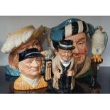 A collection of Royal Doulton Toby character jugs: Winston Churchill, Golfer, The Falconer,