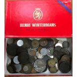 Cigarette box of coins.