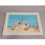 A framed oil on board painting of children at the seaside painted by local artist Sara Butt.