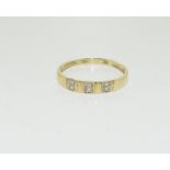 A 9ct gold and diamond ring, size P