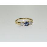 A 9ct gold Tanzanite and diamond ring, Size L.