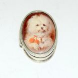 Silver pill box with enamel lid depicting a dog.