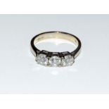 A Diamond three stone approx. 075points set in 18ct gold ring, Size L.