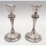 Pair of silver candlesticks.