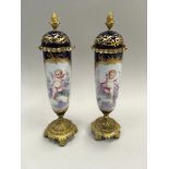 Pair of French 17th century hand painted lidded vases.