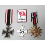 4 x Nazi medals and insignia incl Iron Cross.