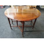 Georgian mahogany drop leaf table on tapered legs and porcelain castors. 106cm x 106cm.