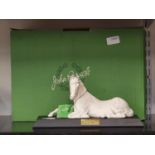 A white Beswick horse on stand "Spirit of Peace".