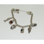 A silver charm bracelet.