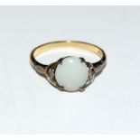 A ladies Opal 9ct gold ring, Size N.