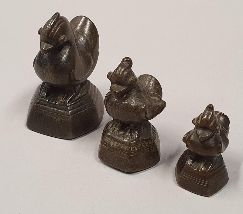 Set of three opium weights. - Image 2 of 6