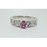 9ct white gold pink sapphire ring, size O.